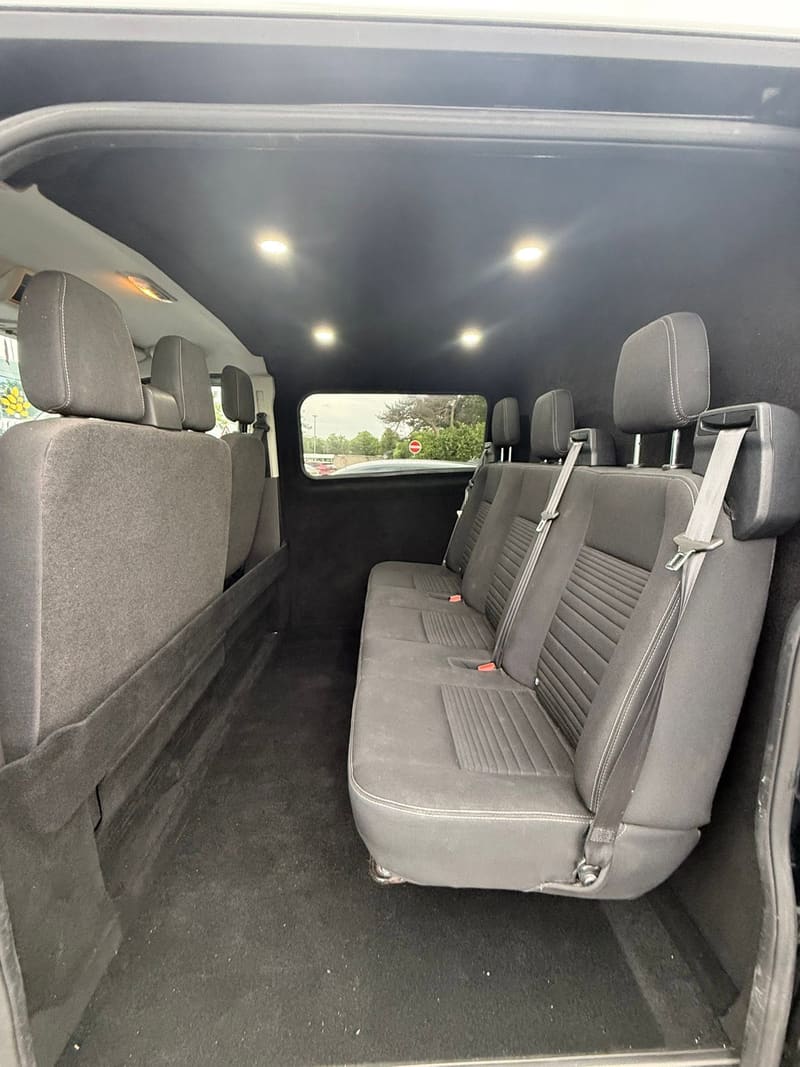 Crew cab conversion with second-row seating installed