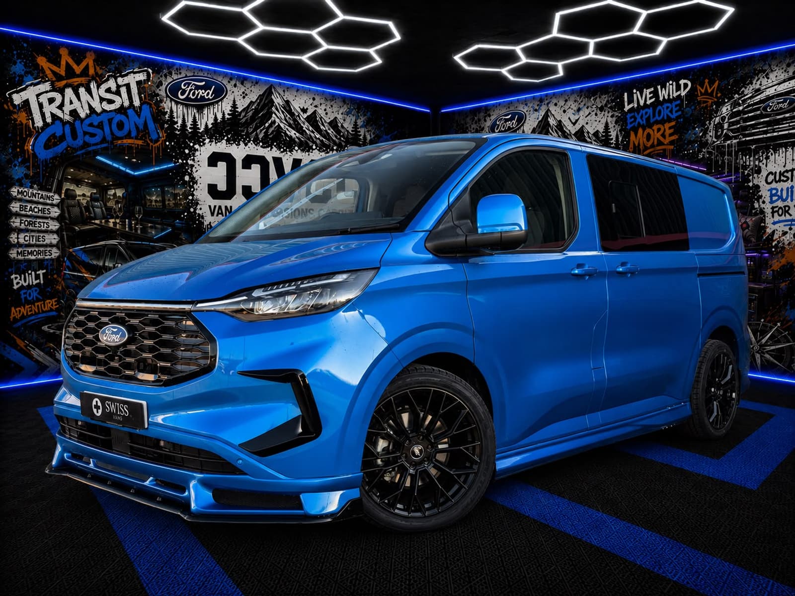 Van in a workshop lit with blue accent lighting