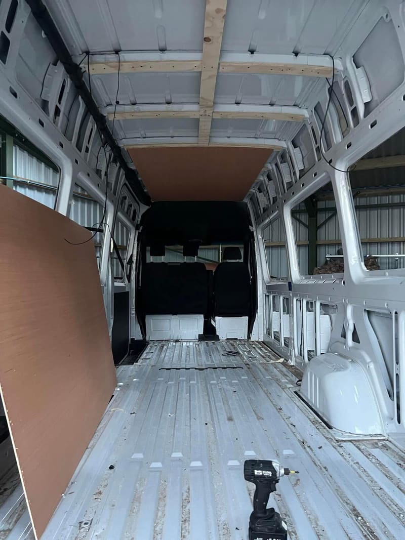 Sprinter interior stripped back with roof battens being fitted