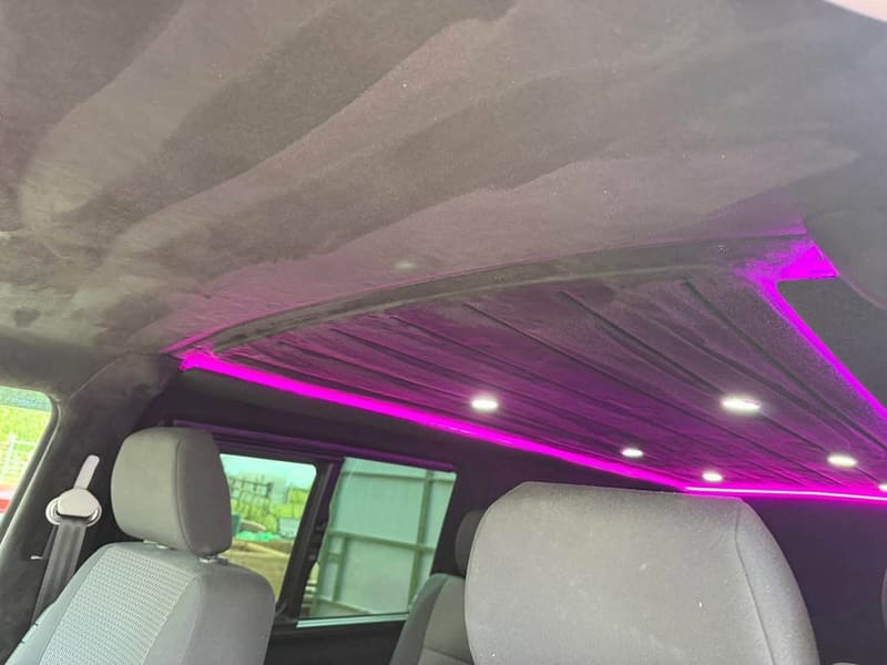 VW Transporter interior with blue ambient lighting